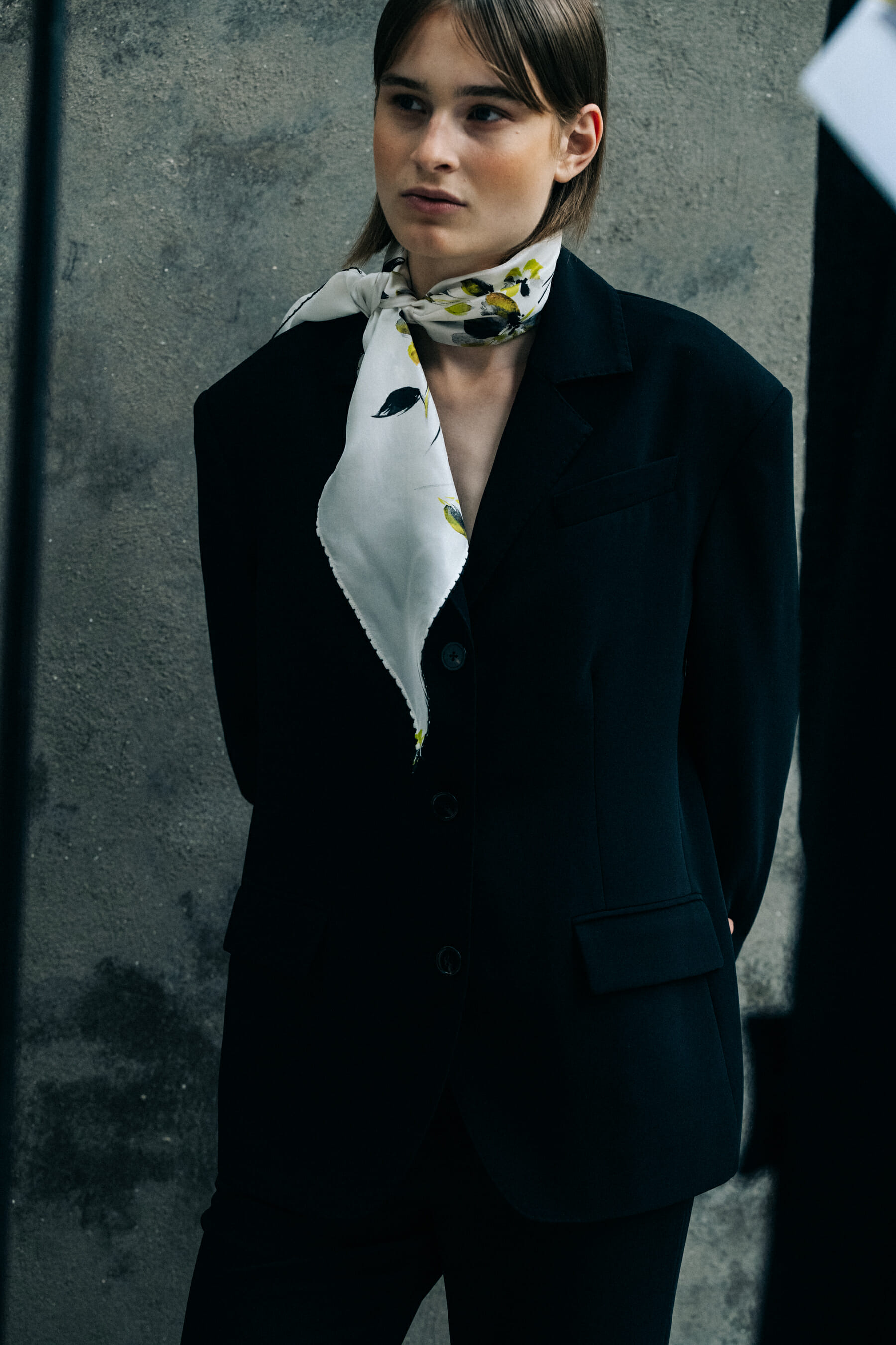 Model backstage wearing black