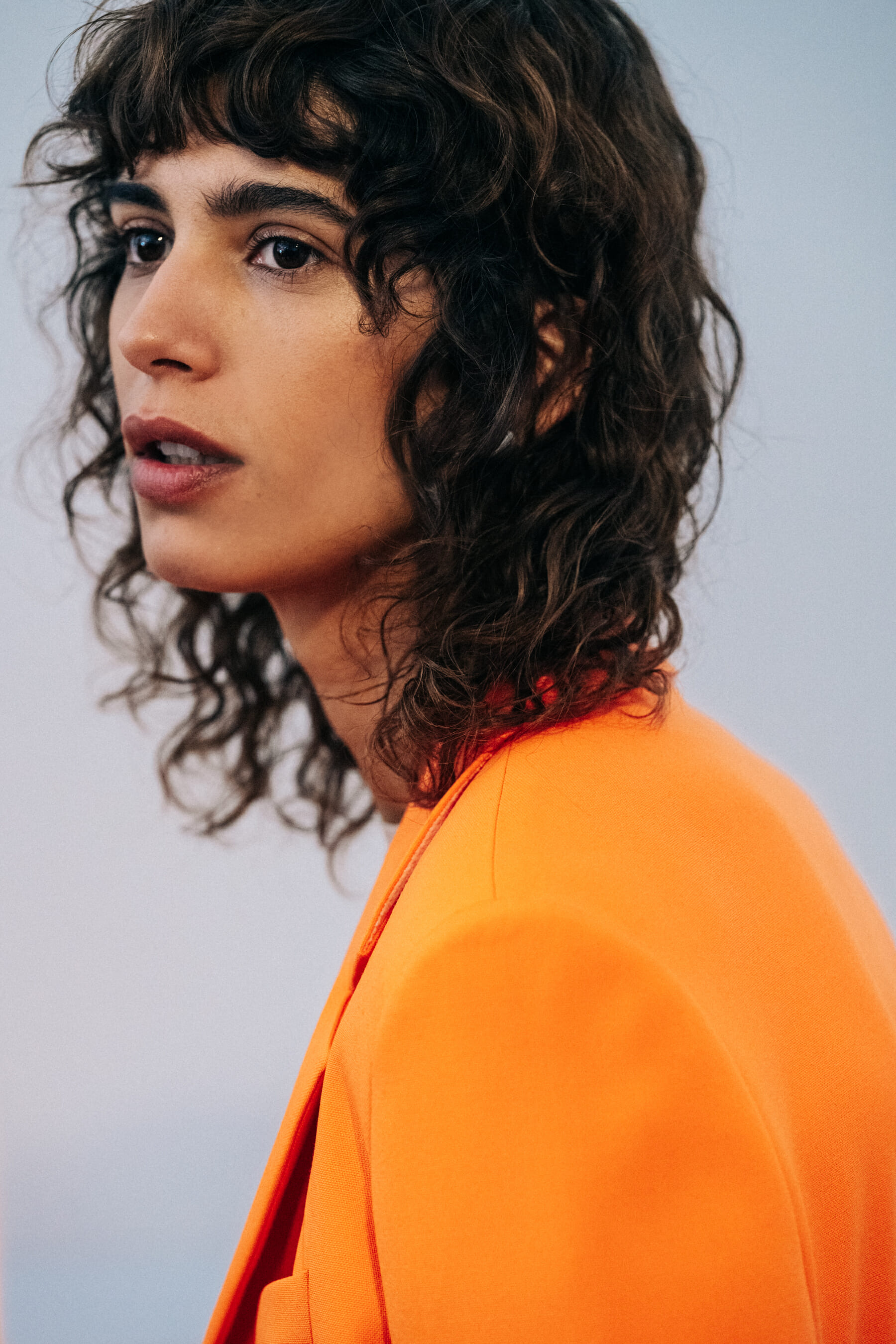 Argentinian model wearing orange